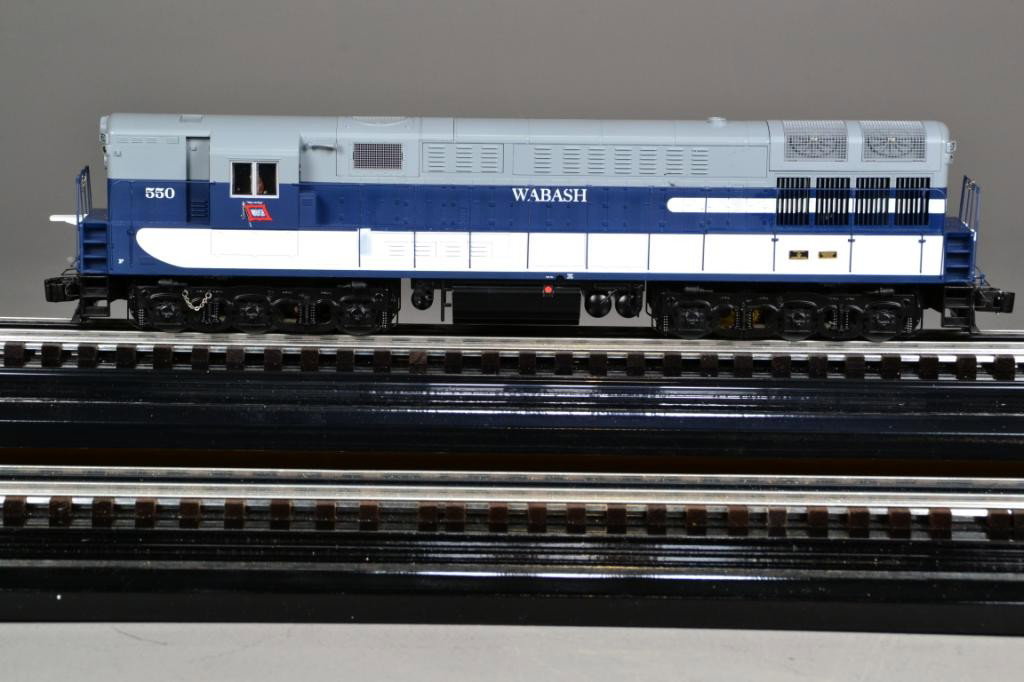 LIONEL WABASH DIESEL LOCOMOTIVE #28307: Wabash FM Trainmaster diesel locomotive, Legacy speed control and control system, rail sounds, two motors, directional lighting, electro couplers (#6-28307), painted gray and blue, white lettering, 18
