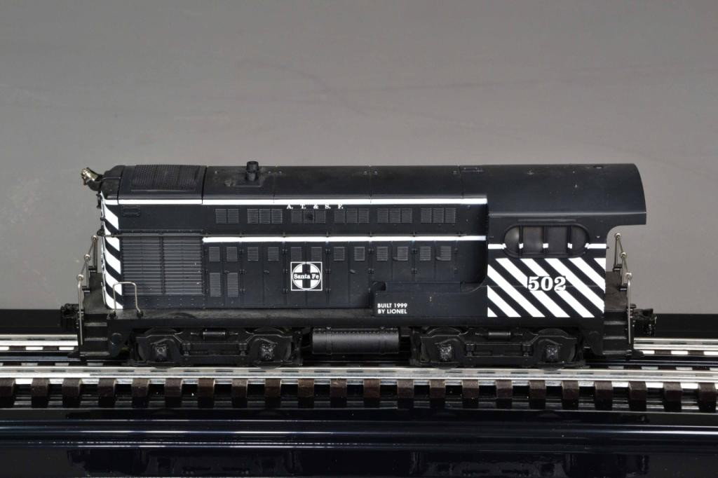 LIONEL SANTA FEW ELECTRIC TRAIN - SWITCHER: Switcher locomotive No 502 (#6-18847) painted black with white logo & lettering, die cast, rear directional lighting, Pull more motor, rail sounds and command equipped, 11" L and new in box. Private c