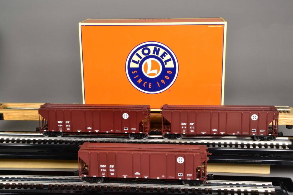 (3) LIONEL BNSF PS-2 CD 4427 HOPPERS: Including three identical red BNSF PS-2 CD 4427 hoppers, numbered 6-27147, 6-27148, 6-27149, 13" L. Private collection Metamora, Mi.