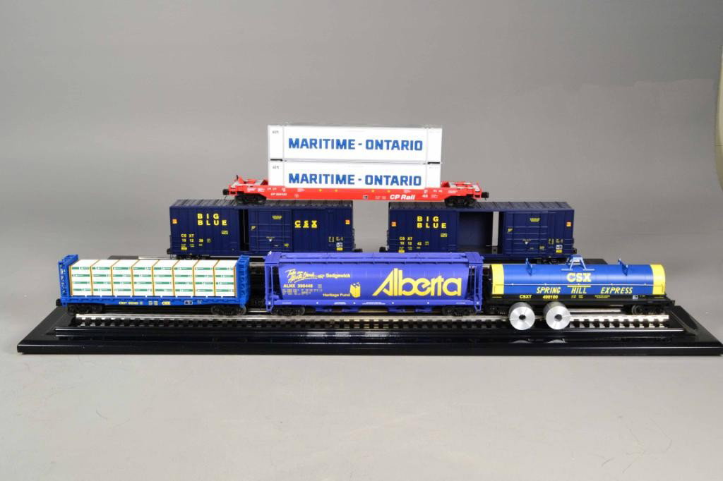 (6) M.T.H. ELECTRIC TRAINS - O SCALE: Including CP Rail (#524153) (#20-95094) Husky Stack Car, painted white with Maritime/Ontario blue lettering, 18" L; Alberta (#396448) 100 Ton Hopper Car (item #20-97646), painted blue with yellow logo