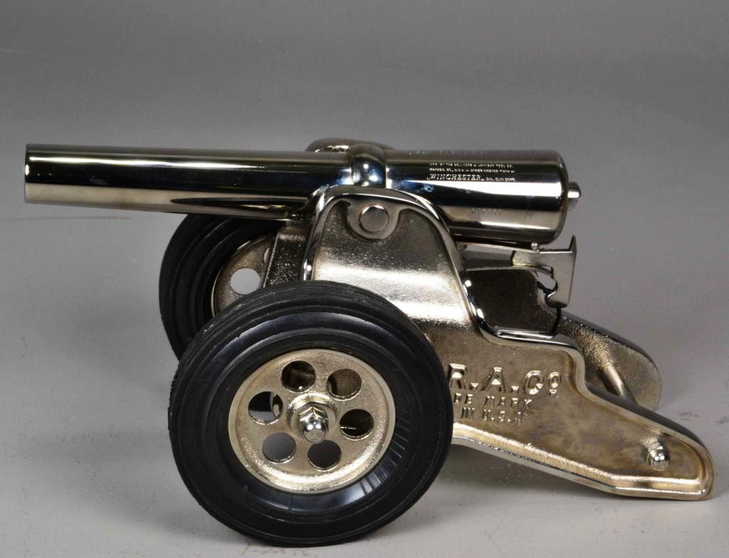 Winchester 10 Gauge Starter Cannon: Serial number 006660, a finely nickel finishes breech load cannon on wheels, stamped on barrel "use 10 ga. Blanks only", made in U.S.A., a very decorative package, circa 1990's - 2000. Private collect