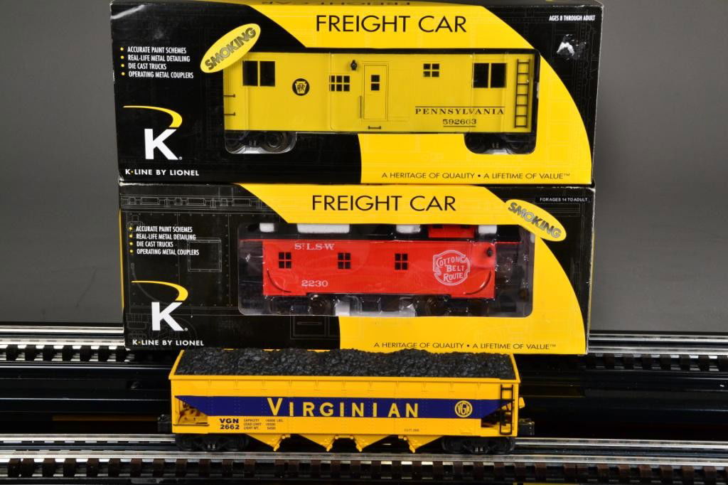 (3) K-LINE FREIGHT CARS: Including three different cars, Virginian Die Cast Hopper (#2662 with coal load), painted maize with navy blue lettering and logo, 13" L; PRR Smoking Bunk Car (#6-21352) painted yellow with black lett