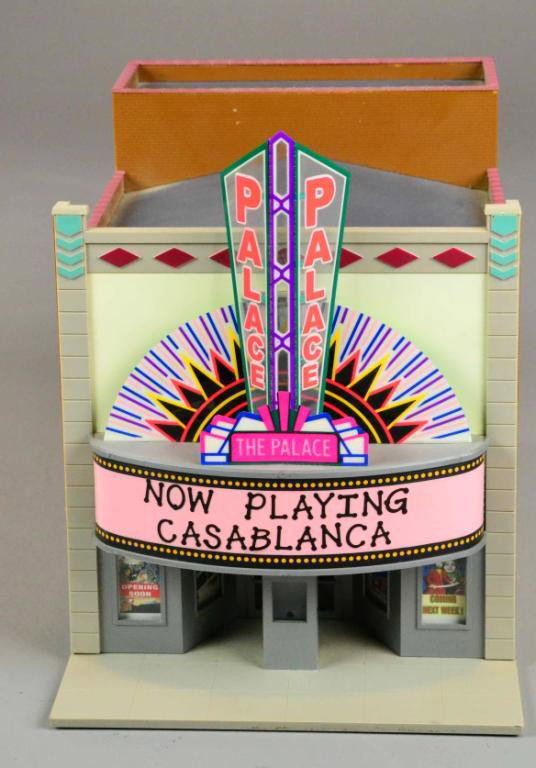 The Palace Theater: The Palace Theater # 933-2713, fully assembled, chase light effects on marquee, lighted entryway, movie poster display "windows", and molded in multiple colors. O/O-27 12.75"L X 7 3/8"W X 9 3/8"H. Pri