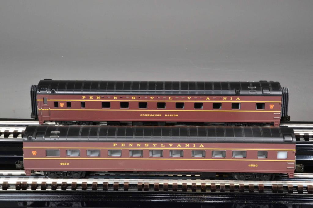 (2) M.T.H. TRAINS - PENN. SLEEPER/DINER SET: Including Pennsylvania 'Conemaugh Rapids,' 70' ABS Sleeper/Diner passenger set, (item# 20-665), both painted burgundy with gold lettering and red logo, 19" L each, new in box. collection Metamora MI.