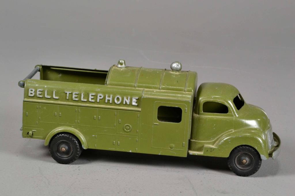 HUBLEY KIDDIE TOY BELL TELEPHONE TRUCK: Toy telephone line truck, die cast, painted olive green, 12" L x 5" W x 5" H, circa 1950, very good condition. Private collection Metamora MI.