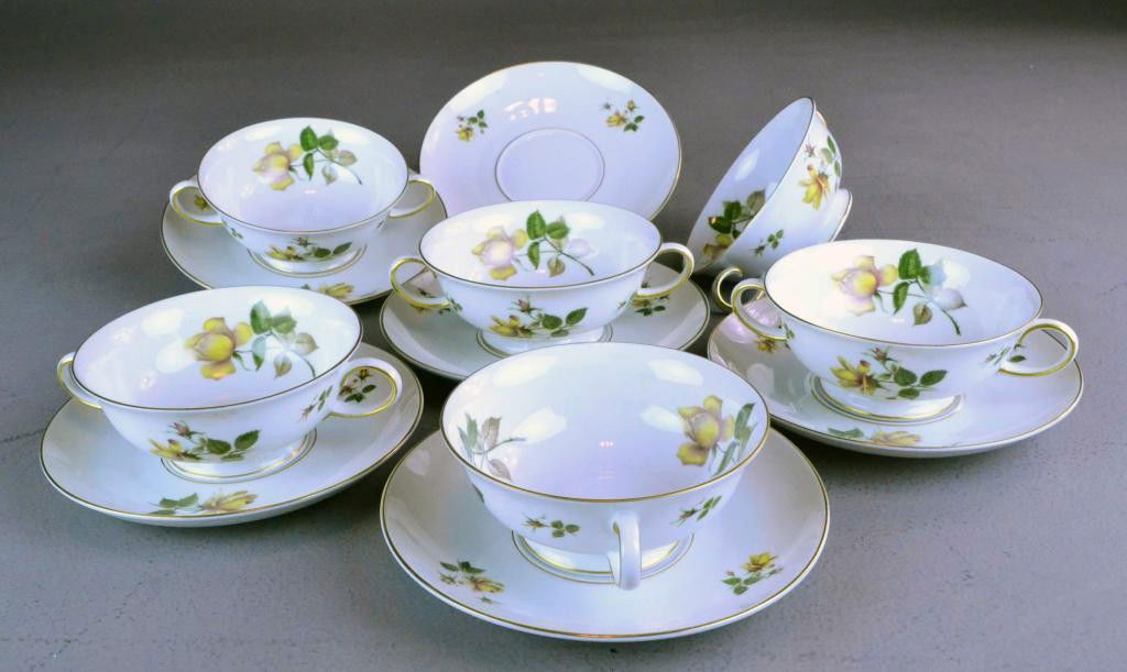 (12) PIECE BOUILLION ROSENTHAL CHINA: (6) boullion bowls, (6) underplates, Rosenthal, Aida, made in Germany, "Charlene" pattern, yellow rose with stem design, 7" diameter underplate, 2.5" H, 5" diameter, bowl. Private collection. Warren M