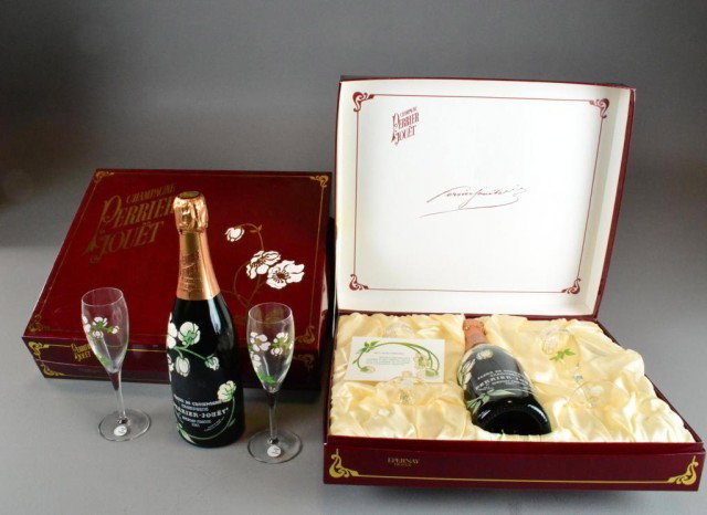(2) PERRIER JOUET CHAMPAGNE GIFT SETS: Including two gift sets containing a bottle of "Fluer De Champagne, Perrier Jouet, Epernay, France 1985 Special Reserve and two matching floral champgne flutes, nicely boxed. Private collection Oxford