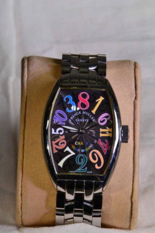 FRANCK MULLER CRAZYHOURS WATCH: Swiss made men's watch, marked Geneve, 'Master of Complications' limited edition numbered #91/5850, entitled "Crazy Hours," also says Color Dreams, each numeral is a different color on a black face, e
