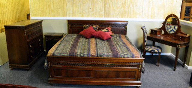 Spectacular (5) Piece Italian Bedroom Set by Cantaluppi: In the Regency style, in finely figured walnut with gilt elements, to include a king size bed, a three drawer night stand, a six drawer dressing table with mirror, and matching chair, and a four drawe