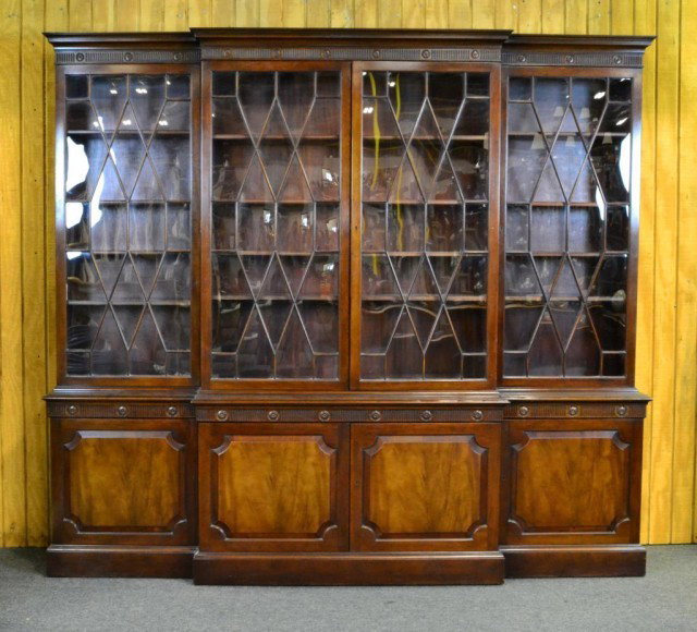 FEDERAL-STYLE MAHOGONY BREAKFRONT: Stunning mahogony breakfront, molded cornice, chequer and feather stringing on four glazed doors, wooden shelved interior over four raised-panel doors, 95.5" L x 86" H x 20" D, circa early 20th centur