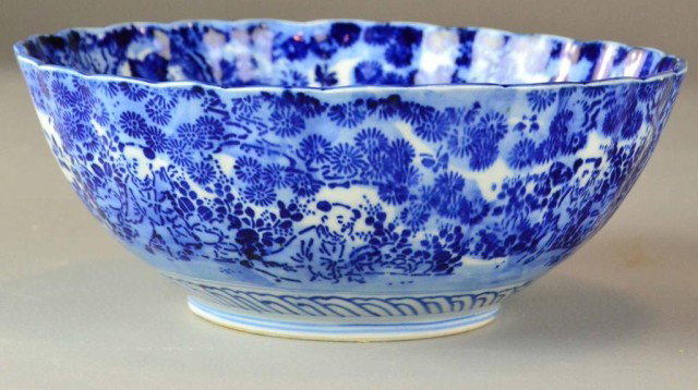 ENGLISH BLUE & WHITE PORCELAIN BOWL: Garden design in blue, 9.25" Diameter, 3.75" H, very minor kiln damage, circa 20th century. Private collection Bloomfield Hills, MI.