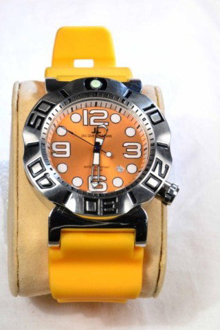 JACQUES LEMANS SPORTS DIVER WATCH: Sporty men's watch, water resistant to 200 meters, all stainless steel, orange face with orange polyurethane band and stainless buckle with JL logo, very good condition. Private collection Metamora MI