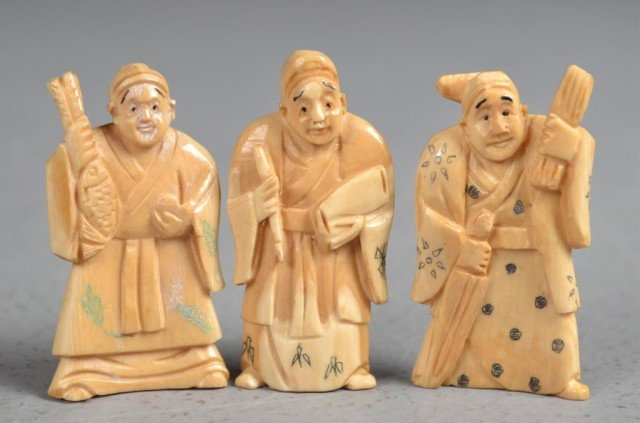 (3)Japanese Carved Ivory Netsuke: Finely carved to depict farmers, tea stained with inked and dyed elements, tallest is 2.25"H, probably Meji period. Private collection Oxford MI.