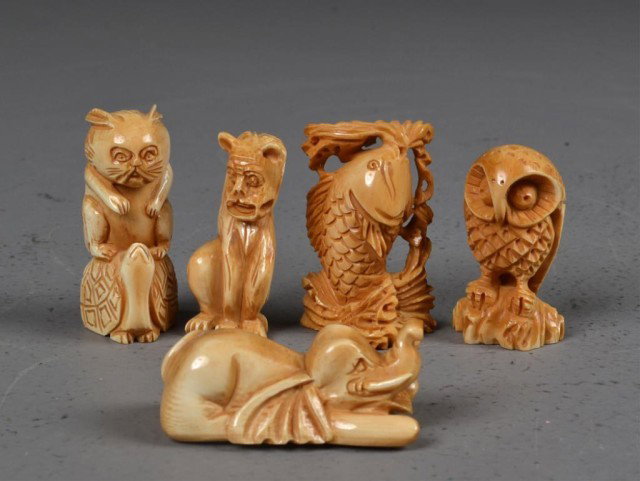 (5)Japanese Carved Ivory Netsuke: Finely carved to depict various animals, to include an owl, a fish, a cat on turtle, an elephant, and a beast, tallest is 2.25"H, probably Meji period. Private collection Oxford MI.