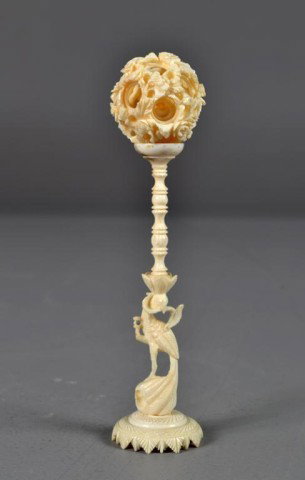 Chinese Carved Ivory Puzzel Ball On Stand: The stand carved to depict a crane, the ball carved to depict lotus, 6.5'H, circa early 20th century.