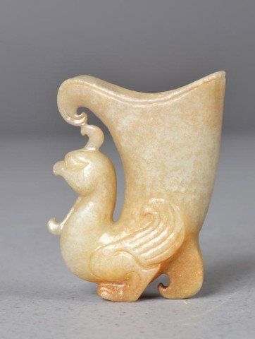 Chinese Carved Jade Quail Cup: Finely carved and polished white to iron red jade in shape of quail, 3" H x 2.25" W x 1" D. Private collection Rochester Hills, MI.