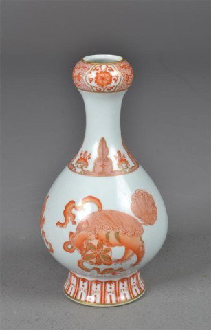 Chinese Porcelain White & Red Garlic Head Vase: Porcelain footed garlic head vase with iron red and gold painted decoration of Foo Lions, six iron red underglazed marks on bottom, 9.75" H x 5" Diameter. Private collection Rochester Hills, MI.