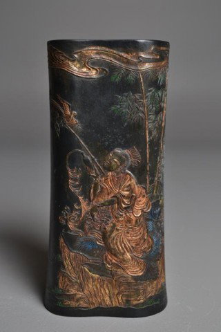 Chinese Inkstone Hand-Painted Headrest: Modeled, carved and polychrome painted inkstone headrest depicting woman with bottle and birds in bamboo; signed, sealed and dated on reverse with three rows of calligraphy, five raised marks on top a