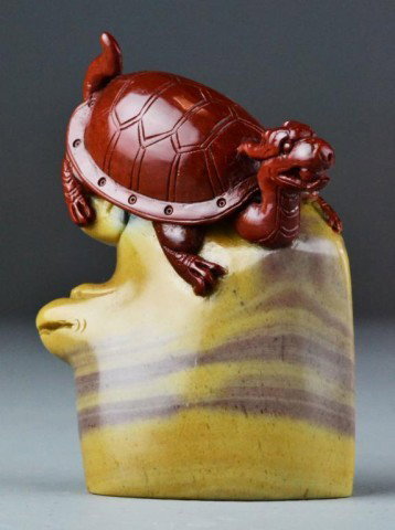Chinese Shou Shan Dragon & Turtle Seal - Blank: Finely carved and polished Shou Shan, turtle is iron red standing atop a tan colored dragon, uncarved seal face/bottom, 4.5" H. Private collection Ontario, Canada.