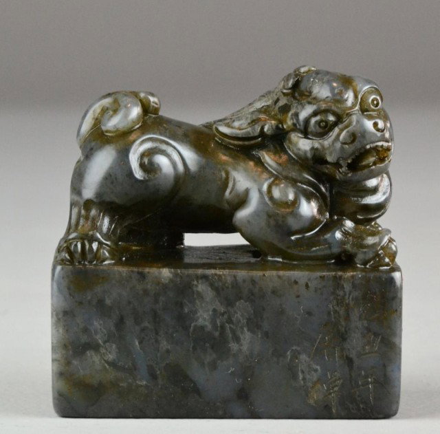 Chinese Shou Shan Stone Foo Lion Seal: Finely carved and polished Foo Lion seal, dated and signed on the front cyclical date yi chou and the artist's name Tu Zhuo, face/bottom carved with five characters: yi zhong tai shan qing, 3" H x 3" 