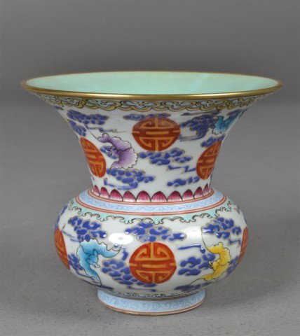 Chinese Famille Rose Spitoon Enamelled Vase: Spitoon-shaped footed vase with overall polychrome enamelled decoration of longevity symbol, bats and coulds, interior glazed in aqua, six blue underglazed marks on bottom within two concentric circle