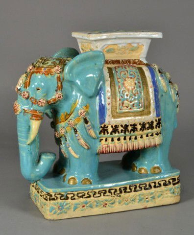 Chinese Famille Verte Porcelain Garden Seat: Molded to depict capresioned elephant in various colors against a robin egg blue ground, 16.5"H X 16"W, circa 19th century, loss and repair to top pedastel, restoration to left ear otherwise a nice ea