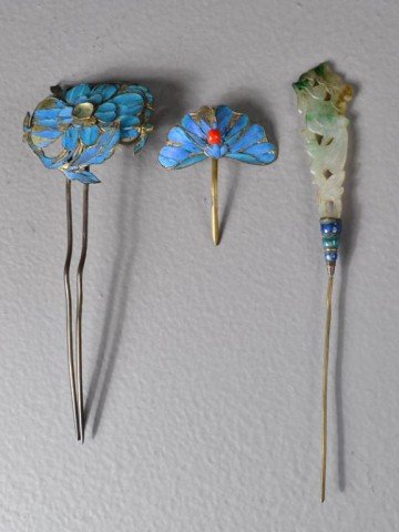 (3)Chinese Hair Pins Inc. Jade & King Fisher: Including two hairpins with king fisher feathers, one in the shape of a lotus blossom, one in the shape of a butterfly with small coral bead, together with a third hair pin with jade plaque finely car