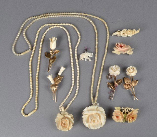 (18) Pcs. Chinese Carved Ivory Jewelry: To include two necklaces beautifully carved in the shape of lotus blossoms, four sets of earrings, seven broaches, two bangles, a carved ivory elephant pendants, and one very nice carved ivory hair pi