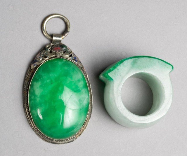 (2) Chinese Jade Pendant & Archers Ring: Includes a oval pendant mounted in silver and enamel, together with a archers ring. Largest 1.5" L, circa 20th century.