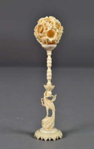 Chinese Carved Ivory Puzzel Ball On Stand: The stand carved to depict a crane, the ball carved to depict lotus, 6.5'H, circa early 20th century.