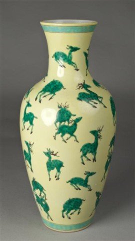 Large Chinese Porcelain Deer Vase: Yellow vase with numerous deer in varying positions in green glaze, mouth and bottom with band of turquoise glaze in-between two bands of gilt. Bears a six character mark in underglaze blue on undersi