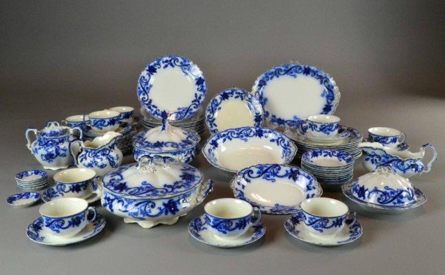 (82) PCS. FLOW BLUE BY JOHNSON BROS., ENGLAND: Including oval and round covered vegetable dishes, open vegetable dish, berry bowls, covered butter dish, butter pats, gravy bowl, creamer and sugar, small and medium platters, dinner, salad & bread p