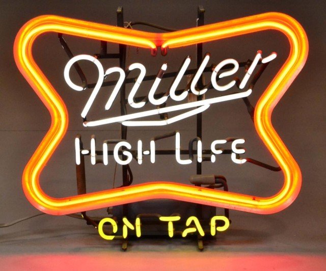Antique Miller Three Colored Neon Sign: Reading Miller High Life on Tap, in red, white, and yellow, in excellent working condition and displays beautifully, 21" W x 21" H, circa 1940s-50's, condition very dusty. Private collection Imlay Cit