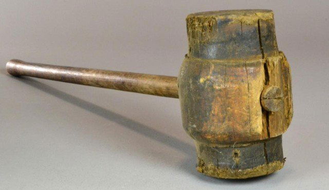 Burl Wood Mallet: A large burl head with wooden handle, 38" L x 10" W, possibly used in circus or carnival, condition commensurate with age, late 19th century, Private collection Columbiaville, MI.