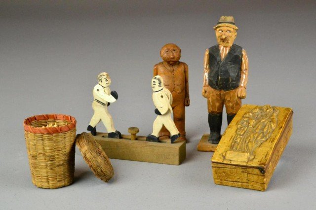 (5) Vintage Folk Art Pieces: Including a small finely carved wood toothpick holder of a man wearing a vest, with a handlebar moustache, initialed on the bottom H.M. Also another carved wood toothpick holder of a man with a hat an