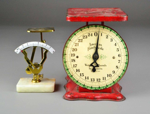 (2) PCS. WEIGHT SCALES: Including one functional American Family Scale painted red with white face (25#) tin scale 8.5" H, along with decorative brass 6.25" H scale with marble base 4" x 2.75", good condition. Private collec