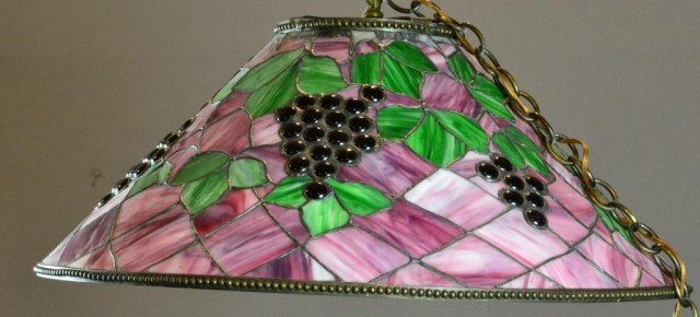 Arts & Crafts Leaded Glass Hanging Lamp: Very nice colored glass light fixture, light purple & white striated field with dark purple glass cabochons as grapes surrounded by verigated green leaves, beaded copper rims, holds four lightulbs, 14