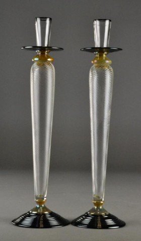Studio Paran For Tiffany & Co.Venitian Candlestic: Each with swirled glass bodies, applied amber foot and drip ledge, made for Tiffany & Co. by Studio Paran, 16.25" H, circa mid 20th century.