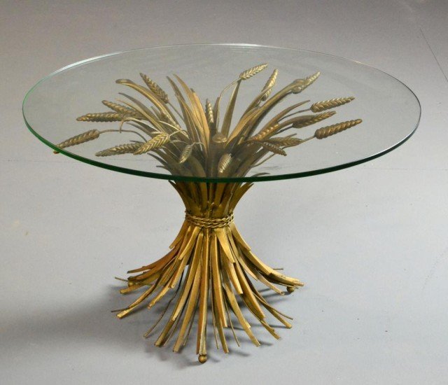 Mid Century Italian Tole Metal And Glass Table: The gold gilt metal formed in wheat sheaf design with circular glass top. 16.5" H x 26" D, mid 20th century