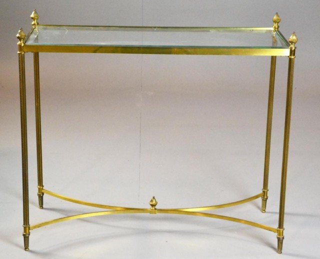 Regency Style Brass Sofa Table With Beveled Glass: With acorn finials on each corner, and one on the bottom center, reed decorated legs, 30.5" H x 34" L x 14" W, circa mid century.