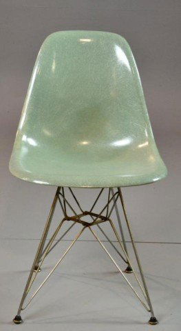 Charles Eames For Herman Miller Chair: With a green fiberglass seat and metal Eiffel tower base, sticker on bottom designed by Charles Eames (1907- 1978), Herman Miller, Zeeland MI, shipped from Venice, California, 31" H x 18.5" W x 15" D.