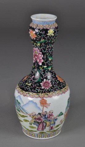 Chinese Famille Noire Vase: Finely enameled, the neck depicting lotus blossoms and tendrils, the body depicting boys at play in a continuos garden, with red four character mark within a red square to bottom, 14"H, circa late 19t