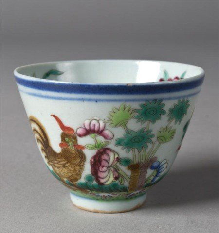 Chinese Famille Rose Porcelain Tea Cup: Finely enameled to depict roosters in a landscape, four character mark within two squares in iron red, 2.1/8"H in custom fitted box circa 20th century.