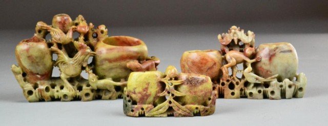 (3) Chinese Carved Soapstone Sculpture: Carved soapstone to depict three separate vasiforms surround by leaves, one has monkey & bat, one has birds & squirrel and one has peach decoration, overall 4" H x 7" L x 1.5" W, some chips. Private c