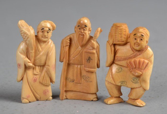 (3)Japanese Carved Ivory Netsuke: Finely carved to depict farmers, tea stained with inked and dyed elements, one with character mark to left foot, tallest is 2.25"H, probably Meji period. Private collection Oxford MI.