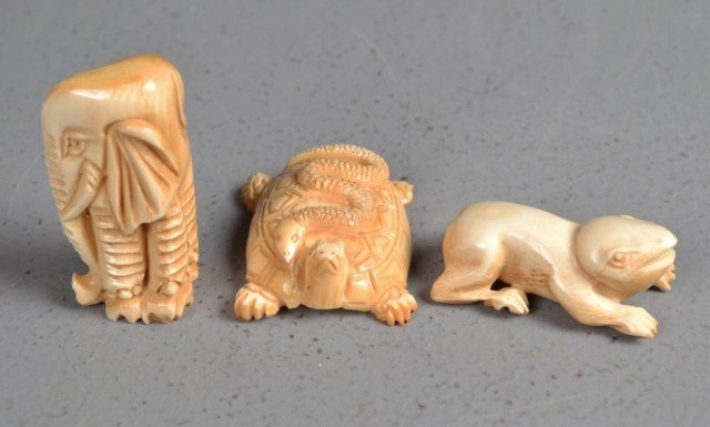 (3)Japanese Carved Ivory Netsuke: Finely carved to depict three animals, one elephant, one frog, and one tortoise with snake on back, tea stained, tallest is 2.25"H, probably Meji period. Private collection Oxford MI.