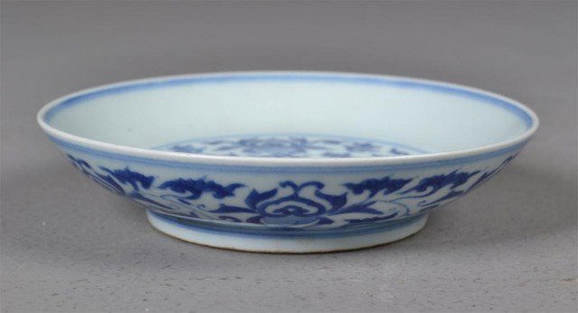 Chinese Blue/White Small Porcelain Plate: Small blue and white porcelain plate decorated with four peaches and longevity symbols, six blue underglazed marks within two concentric circles. 1.25" H x 5.25" Diameter. Private collection Rochester