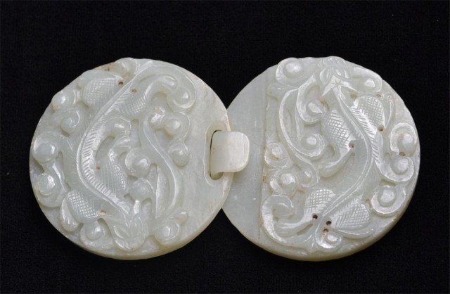 (2) Chinese Carved Jade Belt Hook with Dragons: Two circules of carved light green jade made into a belt hook, each having a carved dragon with scrollwork, 4.25" long together, each disk is 2" Diameter, Private collection Rochester Hills, MI.