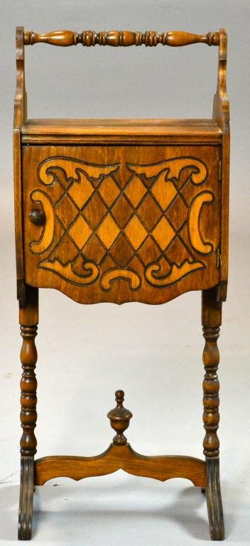 Wooden Smoking Stand: Having turned handle, one door with wooden pull, scroll and diamond incised decoration, above turned legs with urn finial on turned stretcher with reeded trestle feet, circa early 20th century, 28" H 
