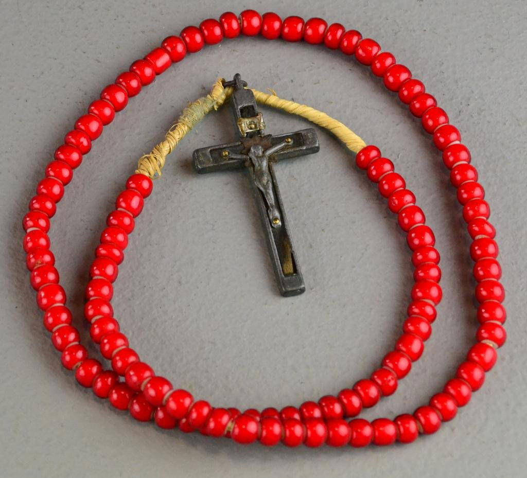 Native American Red Glass Beads & Cross: Ebony and silver metal cross attached to sweetgrass and bright red glass beads, circa 20th century,17" L, good condition. Private collection White Lake, MI.